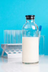 Medical glass bottle with chemical fluid. Laboratory medical research, chemical lab.