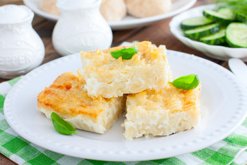 Pasta casserole with egg, sliced into pieces, selective focus