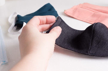 Coronavirus. many species of handmade  and medical surgical  face  protective masks..staying home during the coronavirus pandemia.