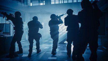 Close Up Portraits of Masked Squad of Armed SWAT Police Officers Storm a Dark Seized Office...