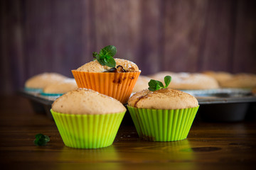 sweet baked muffins with fruit filling in icing sugar