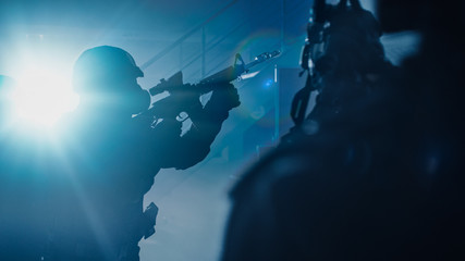 Close Up Portraits of Masked Squad of Armed SWAT Police Officers Storm a Dark Seized Office...