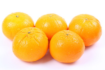 Orange fruit on white background