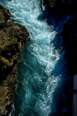 Icelandic storming river flowing between the rocks
