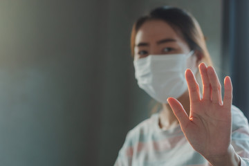 Asian woman wearing protective hygiene mask