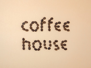 Roasted coffee beans arranged in letters
