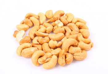 Roasted cashew nuts on white background