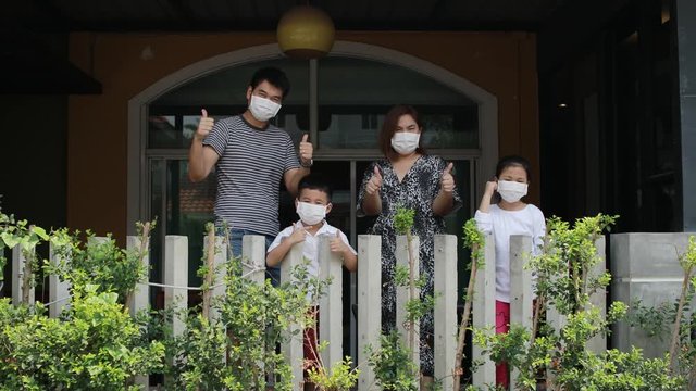 asian family quarantine at home in bangkok thailand while covid-19 disease infected 
