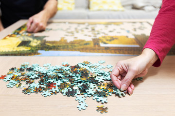 Coronavirus woman hand holding puzzle chip, family concept makin