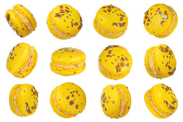 Macro photo of french yellow macaroon isolated on white background, clipping path.