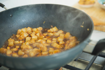 Boil pork with fish sauce. Thai homemade dish. Boil the pork in a pot. Japanese food,Okinawa cuisine Rafuthy. Pork is boiled to prepare food.