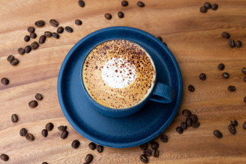 cup of coffee with beans