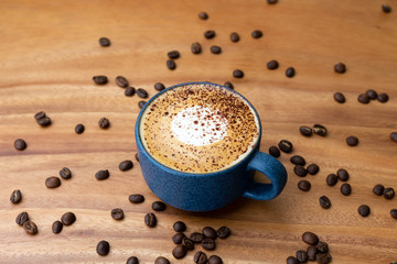 cup of coffee with beans