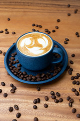 cup of coffee with beans