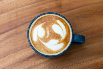 coffee cup on wooden background