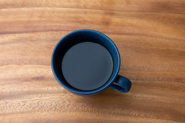 coffee cup on wooden table