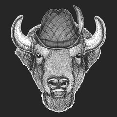 Buffalo, bison, bull head. Oktoberfest. Tirol traditional hat. Beer festival. Portait of animal.