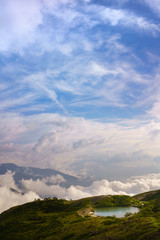 Beautiful pond above the clouds