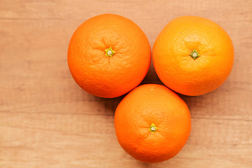 tree natural orange put on the wooden table background.Organic business market