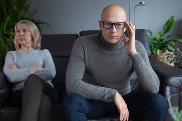 Family quarrel on the couch. The crisis of self-isolation. Exacerbation of relations.