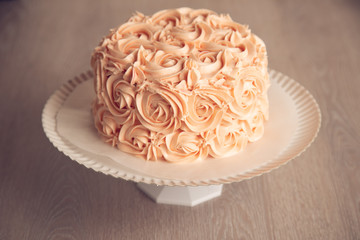 delicious pink round birthday cake