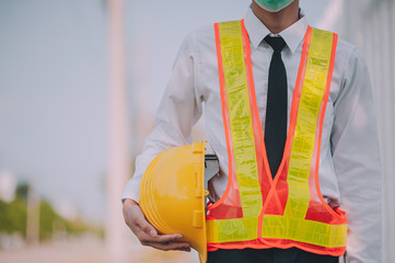 Businessman holding hard hat building estate construction project