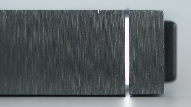 Macro Detail of External Hard Drive On a Table, Led Light Flickering - Solid Aluminium Casing HDD, Minimalist Design Composition 