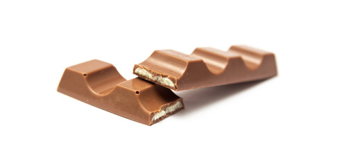 Broken chocolate bar isolated on a white background.