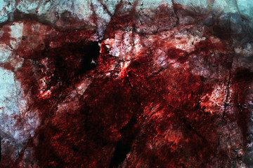 bloody stains of paint on an old worn out paper