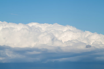 Cumulus clouds in the blue sky
