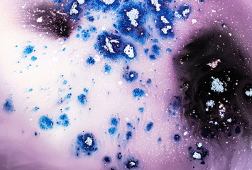 Light creative abstract hand-painted background, marble texture, black dots on milk, acrylic painting fragment on canvas. Contemporary art. Swirl style of marble or ripple agate