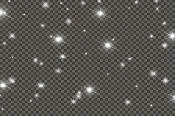 The dust sparks and golden stars shine with special light. Vector sparkles on a transparent background