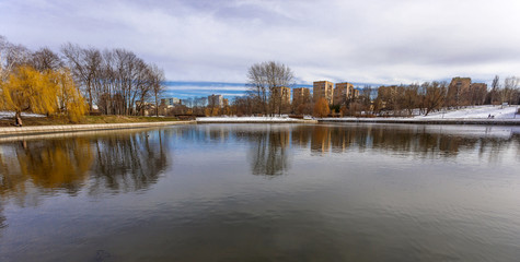 Autumn landscape with lake in the Friendship park in Moscow.  Russia