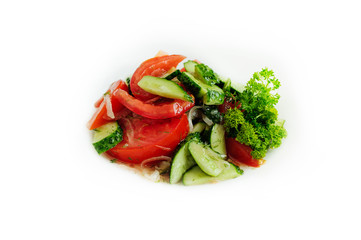 Tomatoes, cucumbers, peppers, onion and lettuce isolated on white