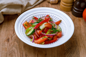 Vegetable salad with tomatoes and cucumbers