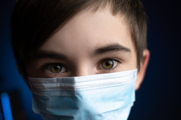 child in a medical mask protection from coronavirus