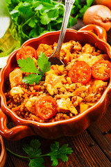 Buckwheat with meat and tomato