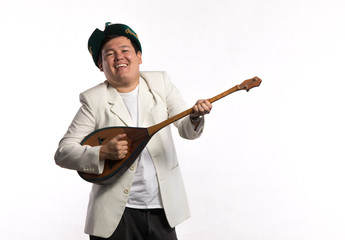 male Kazakh musician with dombra