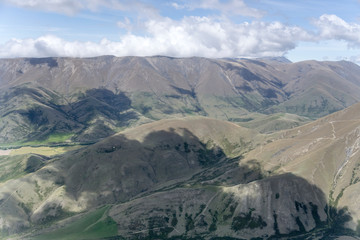 barren slopes of Dromedary hill range, near Lindis Pass,  New Zealand
