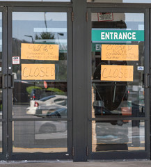 Fototapeta na wymiar Handmade closed for business sign on business door, Berks County, Pennsylvania 