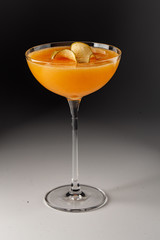 orange cocktail in glass