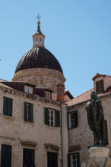 Fototapeta na wymiar Dubrovnik formerly Ragusa, a coastal city in the Dalmatian Region in the Republic of Croatia. Spectacular its churches, walls, houses and stone streets in the Pearl of the Adriatic.