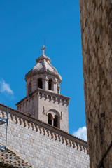 Fototapeta na wymiar Dubrovnik formerly Ragusa, a coastal city in the Dalmatian Region in the Republic of Croatia. Spectacular its churches, walls, houses and stone streets in the Pearl of the Adriatic.