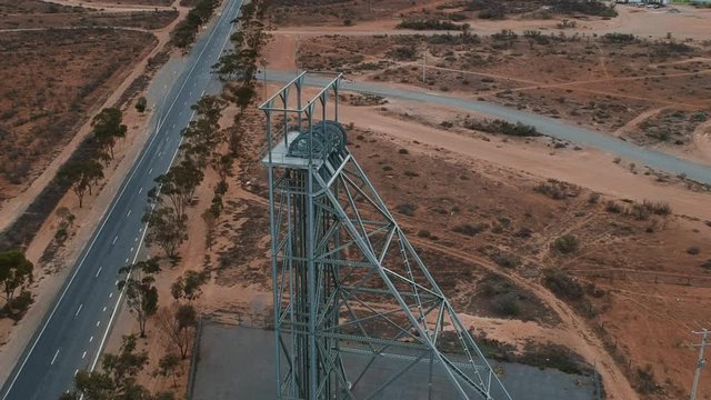 Flying over a mine headframe near Broken Hill Australia
