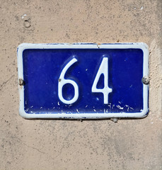 number sixty four on a wall