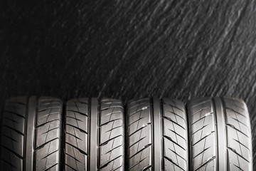 summer sports tires on a dark background. space for text, copy space