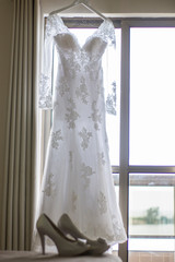 Wedding bridal dress written bride in Portuguese language with shoes.  Wedding concept.