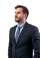 Businessman standing looking away to future perspectives isolated on white background.