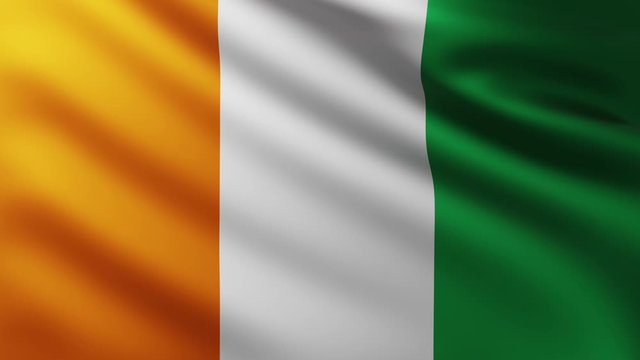 Large Flag of Ivory Coast fullscreen background fluttering in the wind