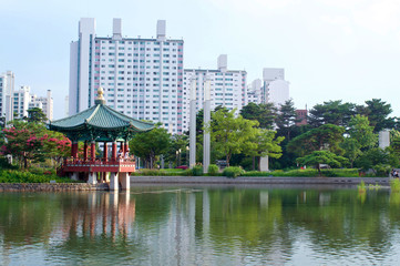 Naklejka premium Pagoda with pond in summer in Seoul